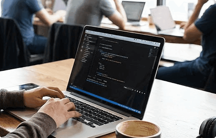 coding on laptop